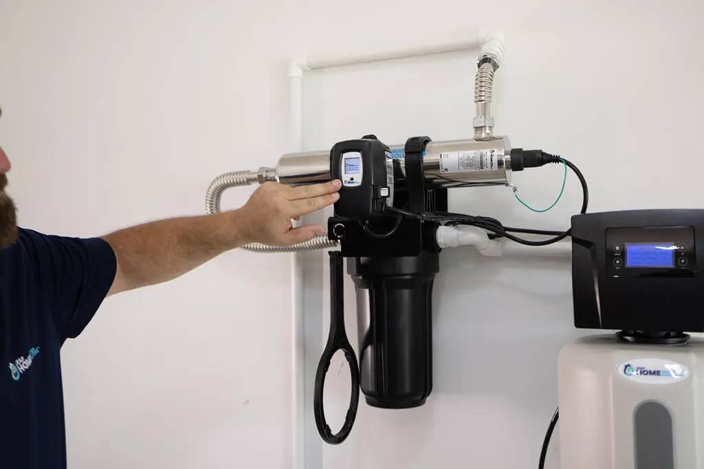 installer calibrating uv water treatment product