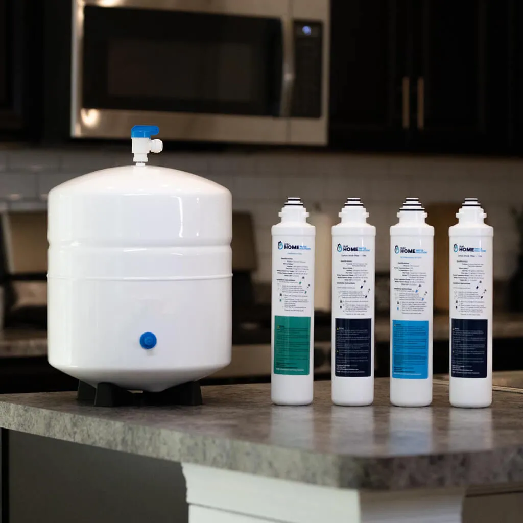 leaf home water solutions reverse osmosis water purification system sitting on top of a counter before installation