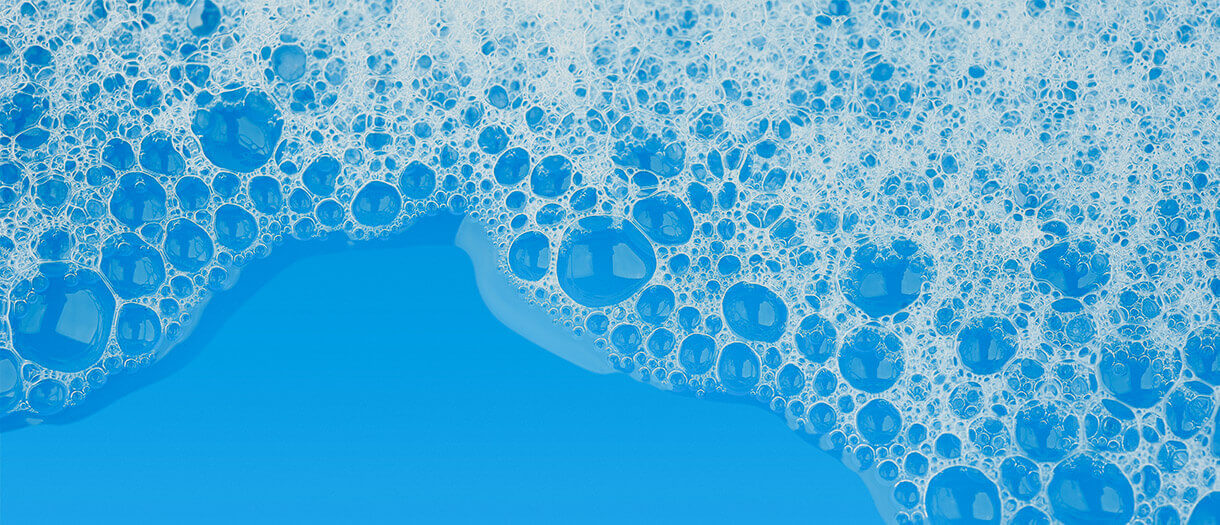 water bubbles on top of a light blue background